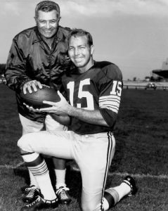 Coach Vince Lombardi (left) and Green Bay Packers player Bart Starr